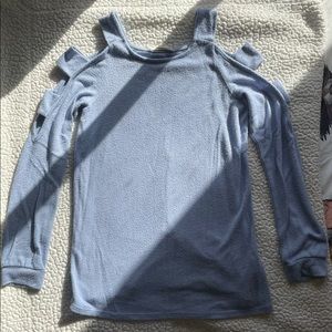 Sweater with arm cutouts